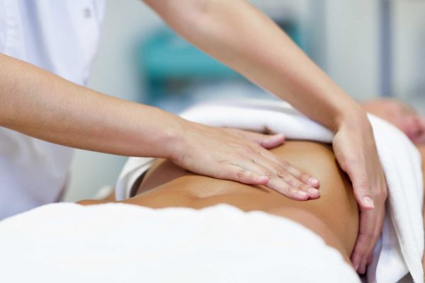 woman-having-abdomen-massage-by-professional-osteo-S9RWU82.jpg